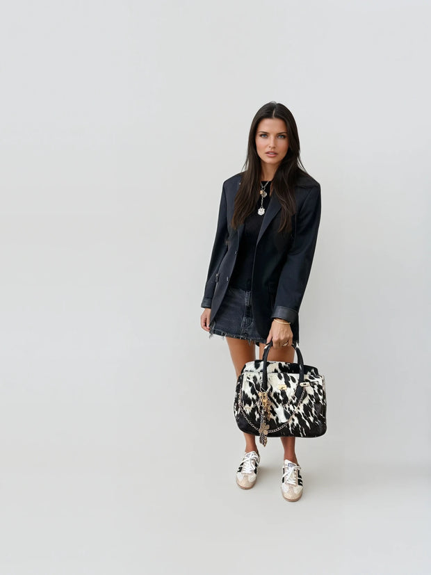 Monochrome Cowhide Statement Bag – Bold and Modern