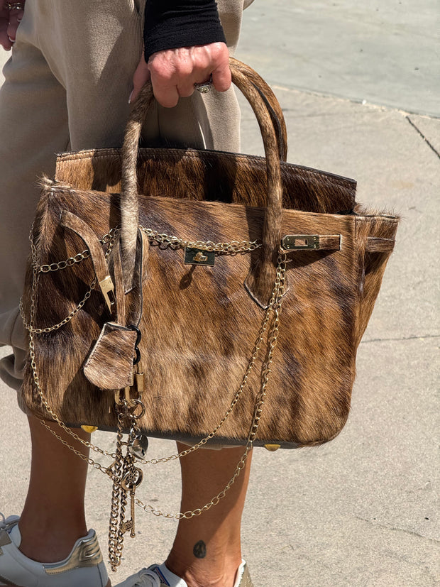 Vintage Luxe Cowhide Tote – Statement Carryall with Chain Detail