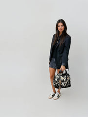 Monochrome Cowhide Statement Bag – Bold and Modern